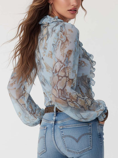 Arena | Blusa de gasa con volantes y cremallera frontal con estampado azul hielo