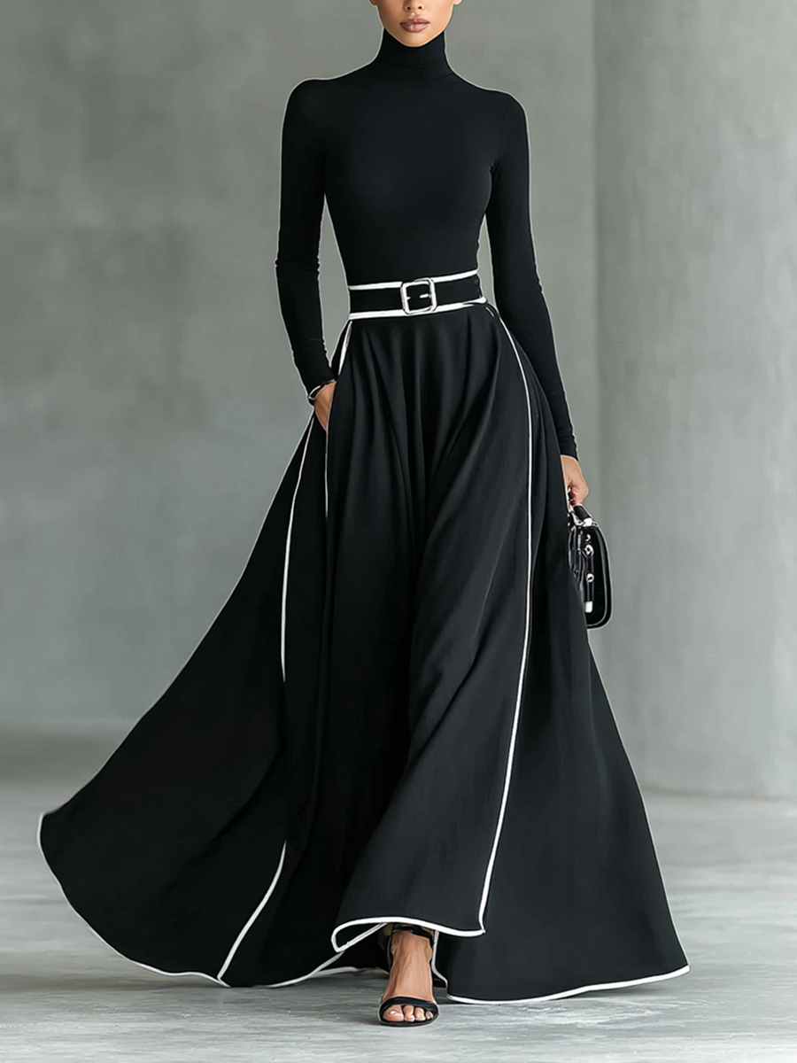 Gina – Vestido largo negro de mujer con costuras blancas, cuello alto, mangas largas y cintura ajustada