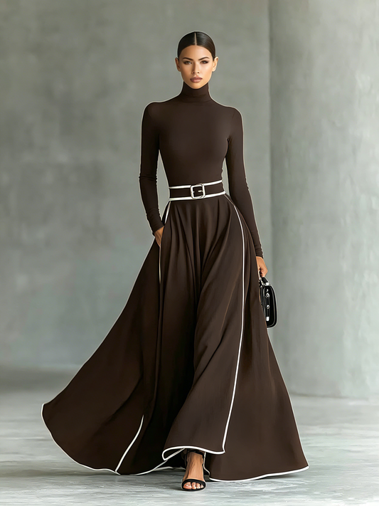 Gina – Vestido largo negro de mujer con costuras blancas, cuello alto, mangas largas y cintura ajustada