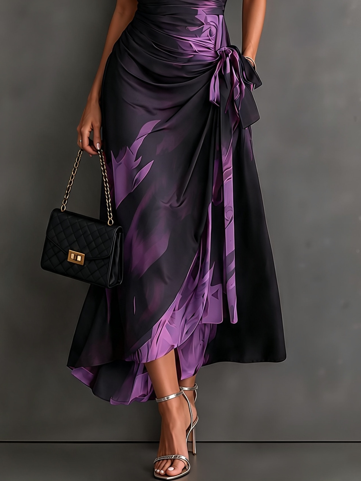 Vestido midi cruzado con estampado abstracto en rojo y negro, cuello en V, manga corta, lazo en la cintura y volantes en el bajo asimétrico