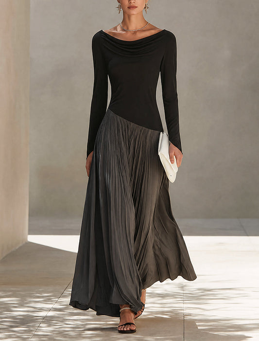 Vestido largo plisado en dos tonos, negro y gris, con diseño de retazos y escote drapeado