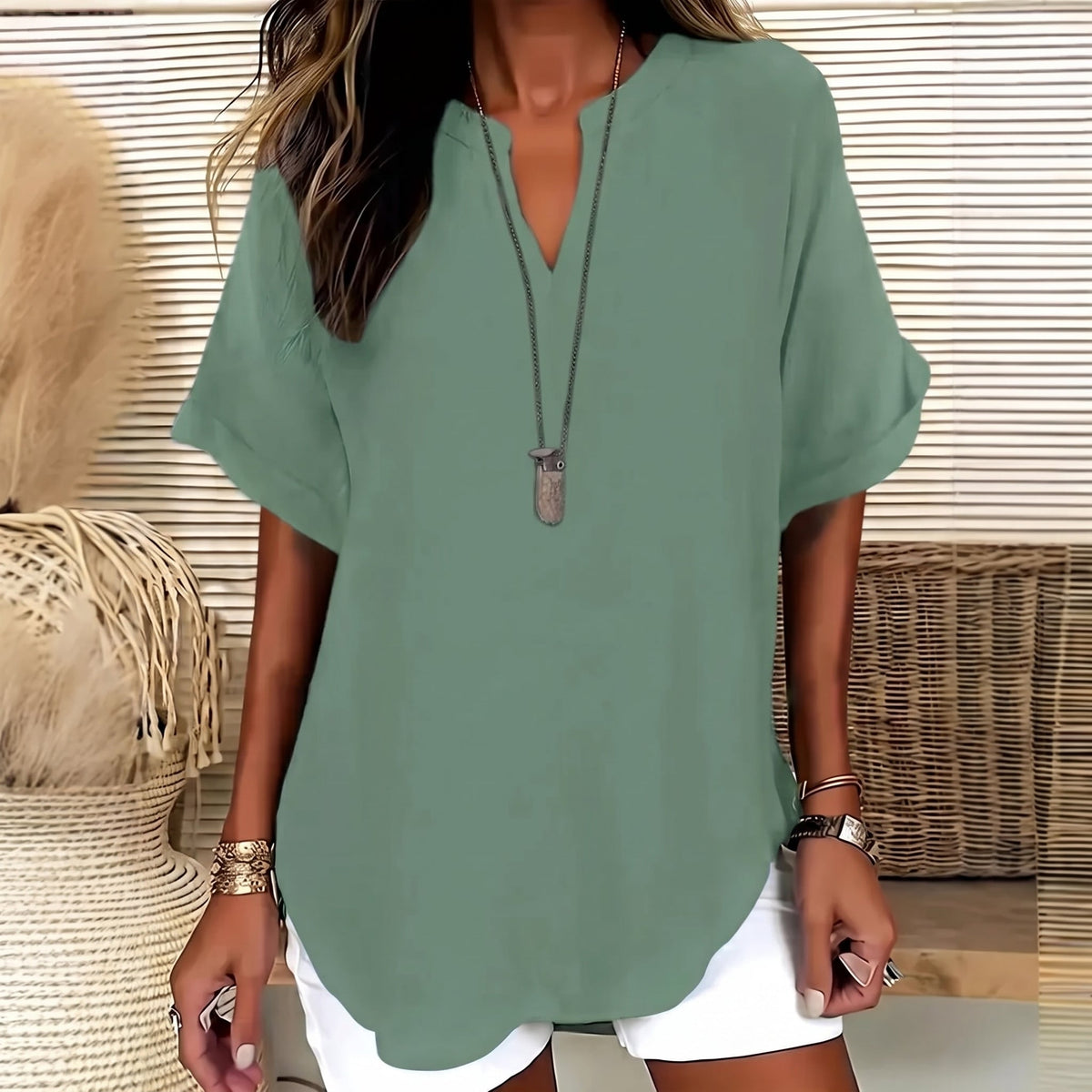 Avelia | Blusa informal de mujer, holgada y de color liso.