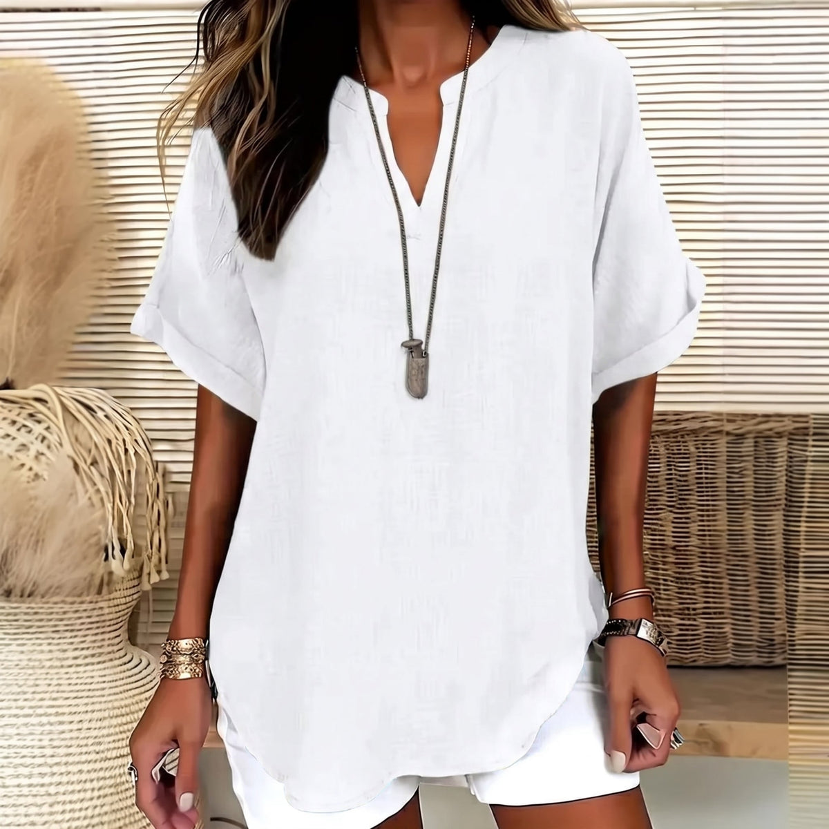 Avelia | Blusa informal de mujer, holgada y de color liso.